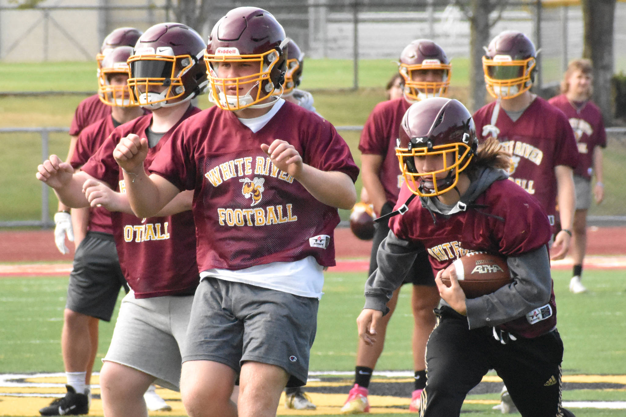 PHOTOS BY KEVIN HANSON Football teams at Enumclaw and White River have been practicing since Aug. 18, preparing for Friday’s season openers.