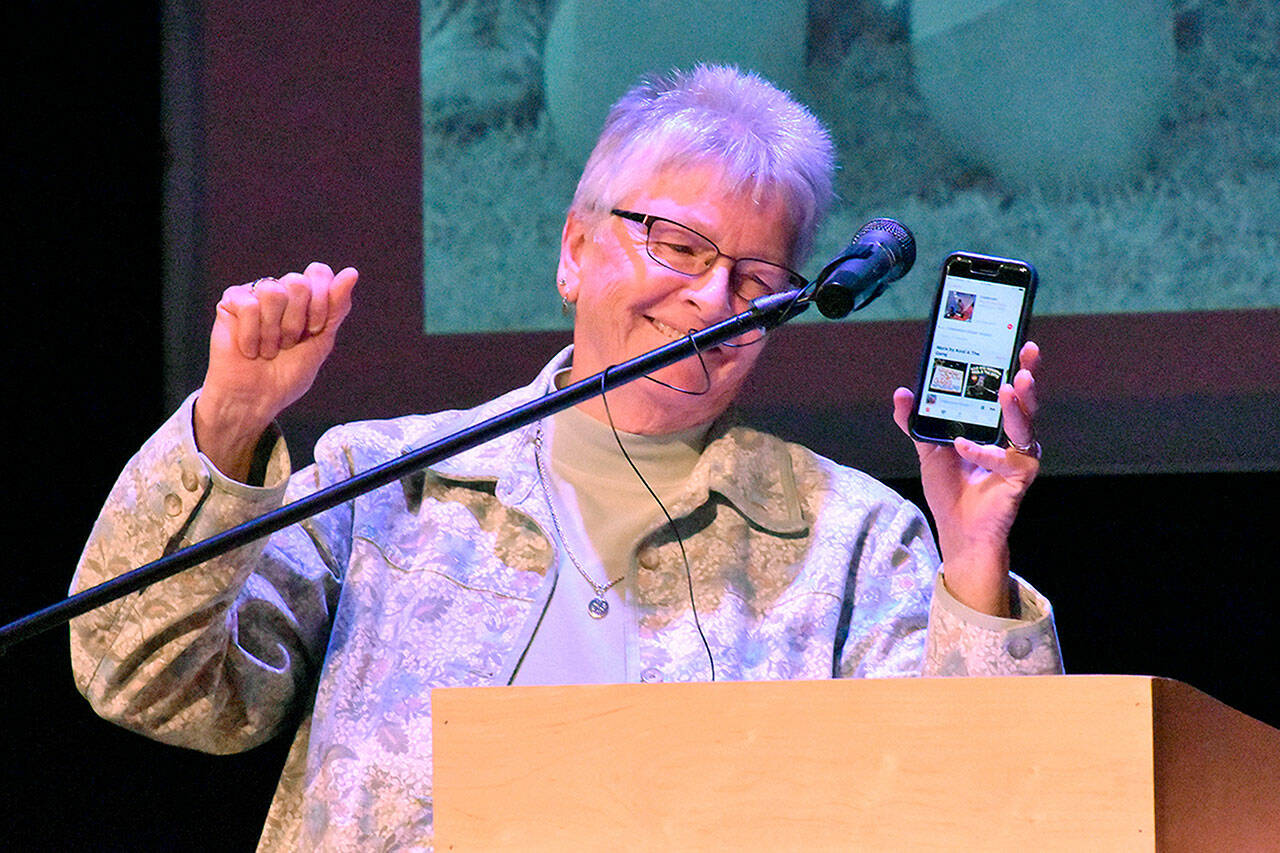 Trena Page, a teacher and coach from 1974 to 1993, accepts her award at the induction ceremony. Photo by Kevin Hanson