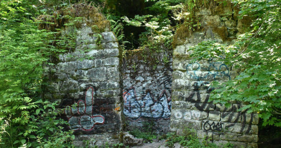 Hiking the Melmont Ghost Town Trail has visitors stepping into the past. Here is the former dynamite shed, where coal minters stored explosives. Photo by Kevin Hanson