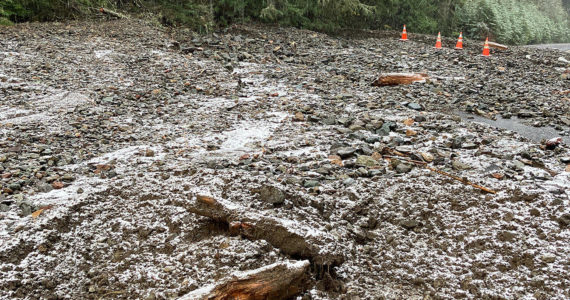 This image from WSDOT on Sunday shows the extent to which debris from a slide reached the roadway on SR 410.