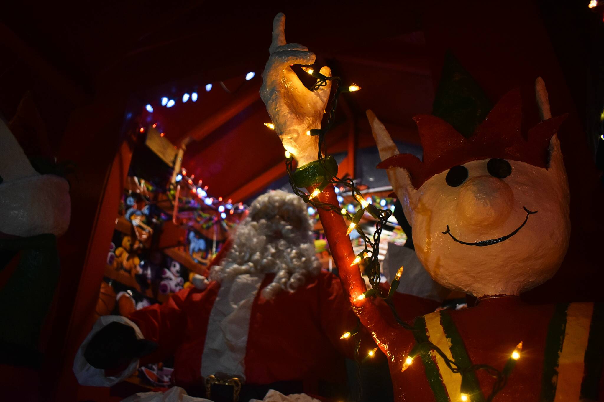 Photos by Alex Bruell
One of two papier-mâché elves accompanying Santa Claus at the Mickelberry Christmas display.