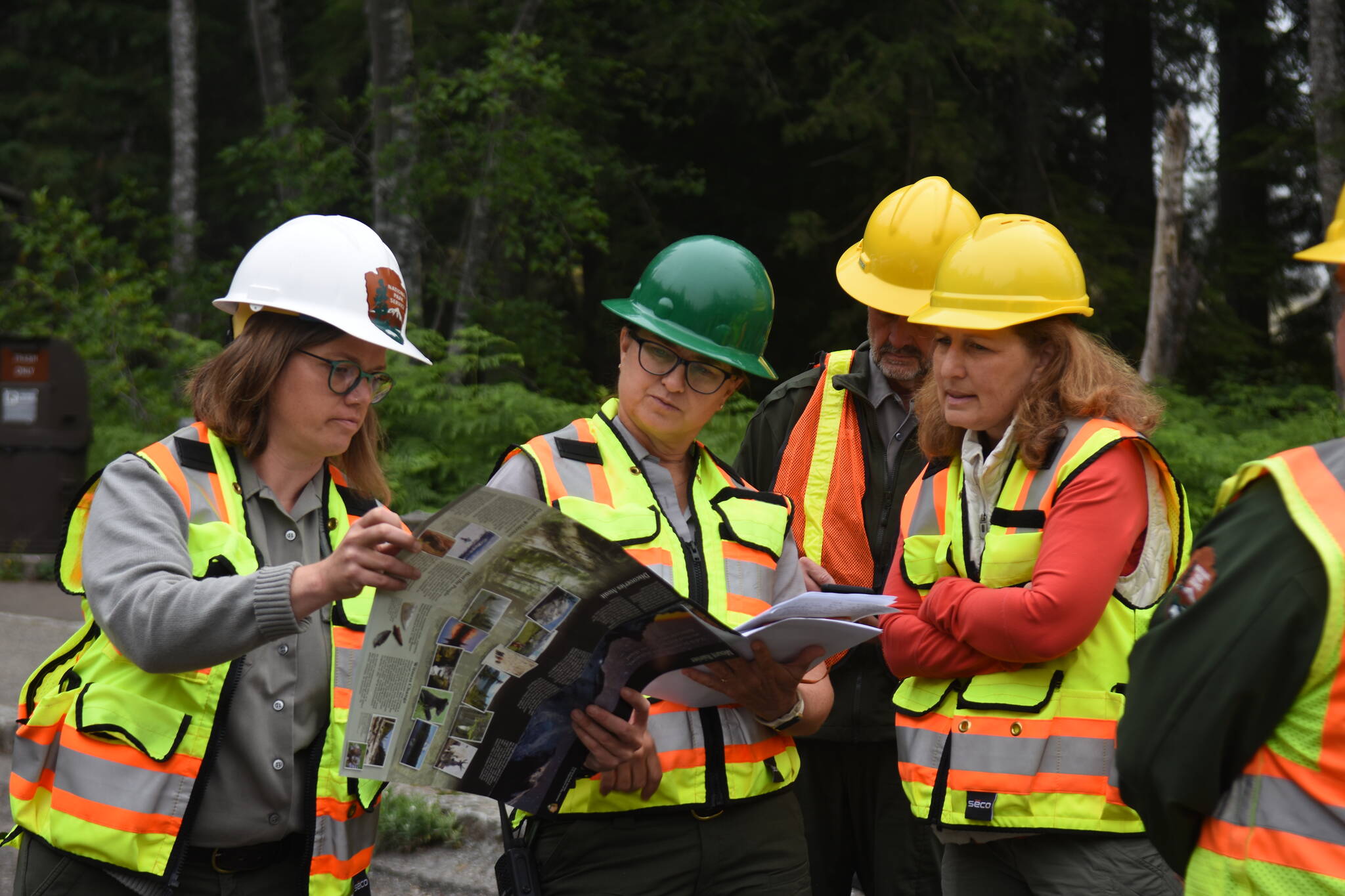 Rep. Kim Schrier (far left) and National Park Service Director Chuck Sams (to her left) met at Mount Rainier National Park last Monday to review the two major construction projects. Photo courtesy NPS