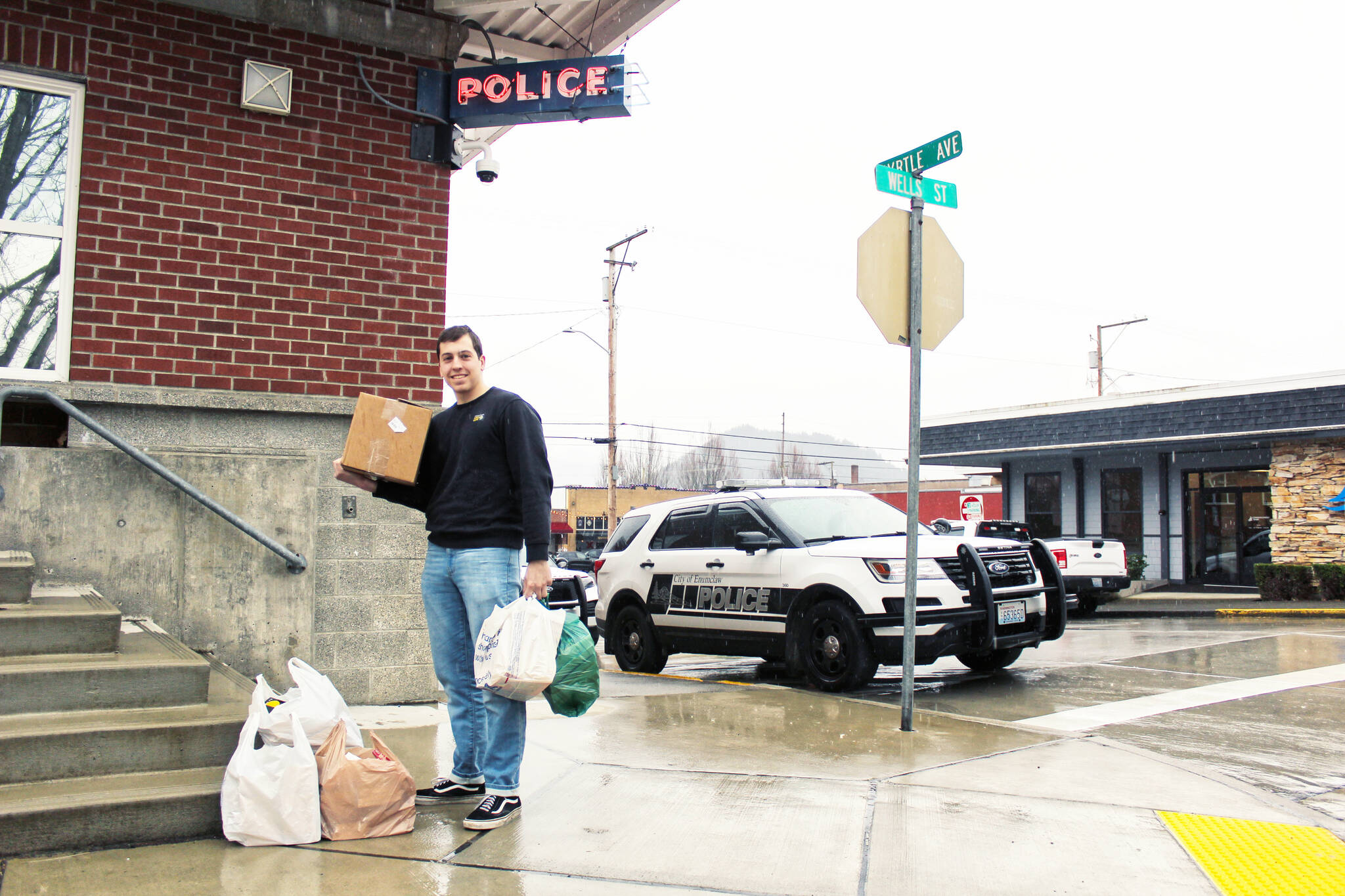 Bryson Fico with his book donations for the Enumclaw jail. Photo by Ray Miller-Still