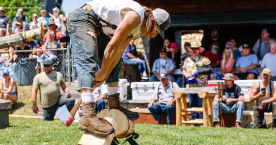 Photos courtesy Ashley Britschgi (Log Show); The Gateway Concert Band; and Flashes by Lor Photography / facebook.com/FlashesByLorPhotography
There are so many events on the Plateau in June, it’s hard to keep track! The Log Show (pictured here is Bo Carlson trying to chop through the a small log) is always a big draw, and the Gateway Concert Band is hosting its annual “Name Those Tunes” concert for the 25th year. Finally, the Culpepper & Merriweather circus is back in town in Buckley.