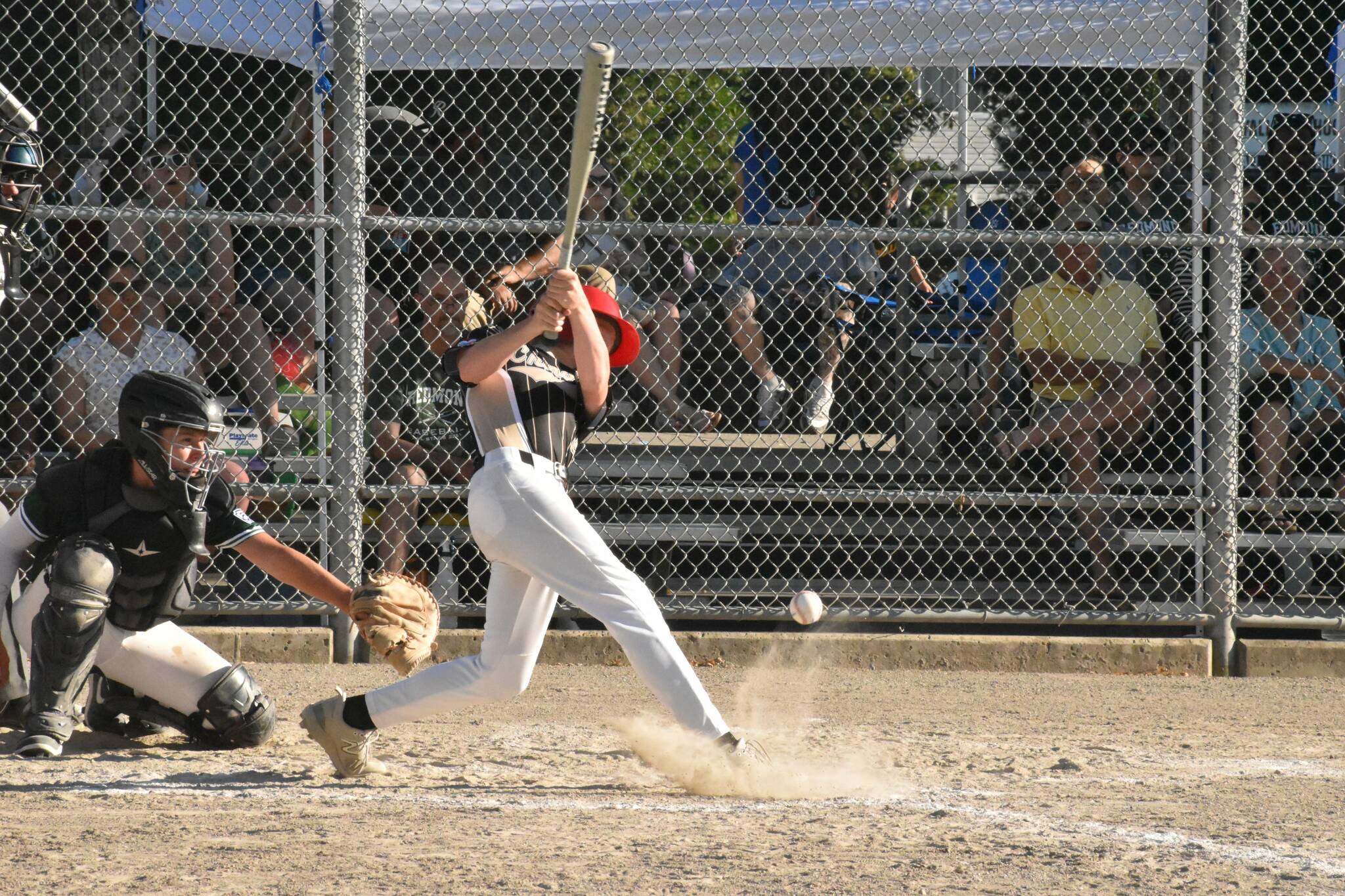 The Chinook Little League All-Stars opened state tournament play July 5 with a victory. Shown here are Chinook’s Wyatt Stombaugh, putting a ball into play during the early innings of the victory over Redmond-West. Photo by Kevin Hanson