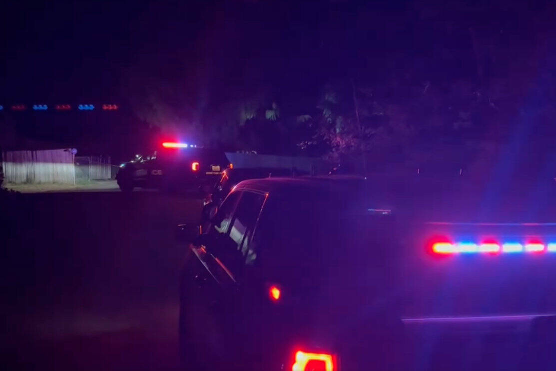 Pierce County Sheriffs Department vehicles outside the home of where a deputy-involved shooting occurred. Screenshot