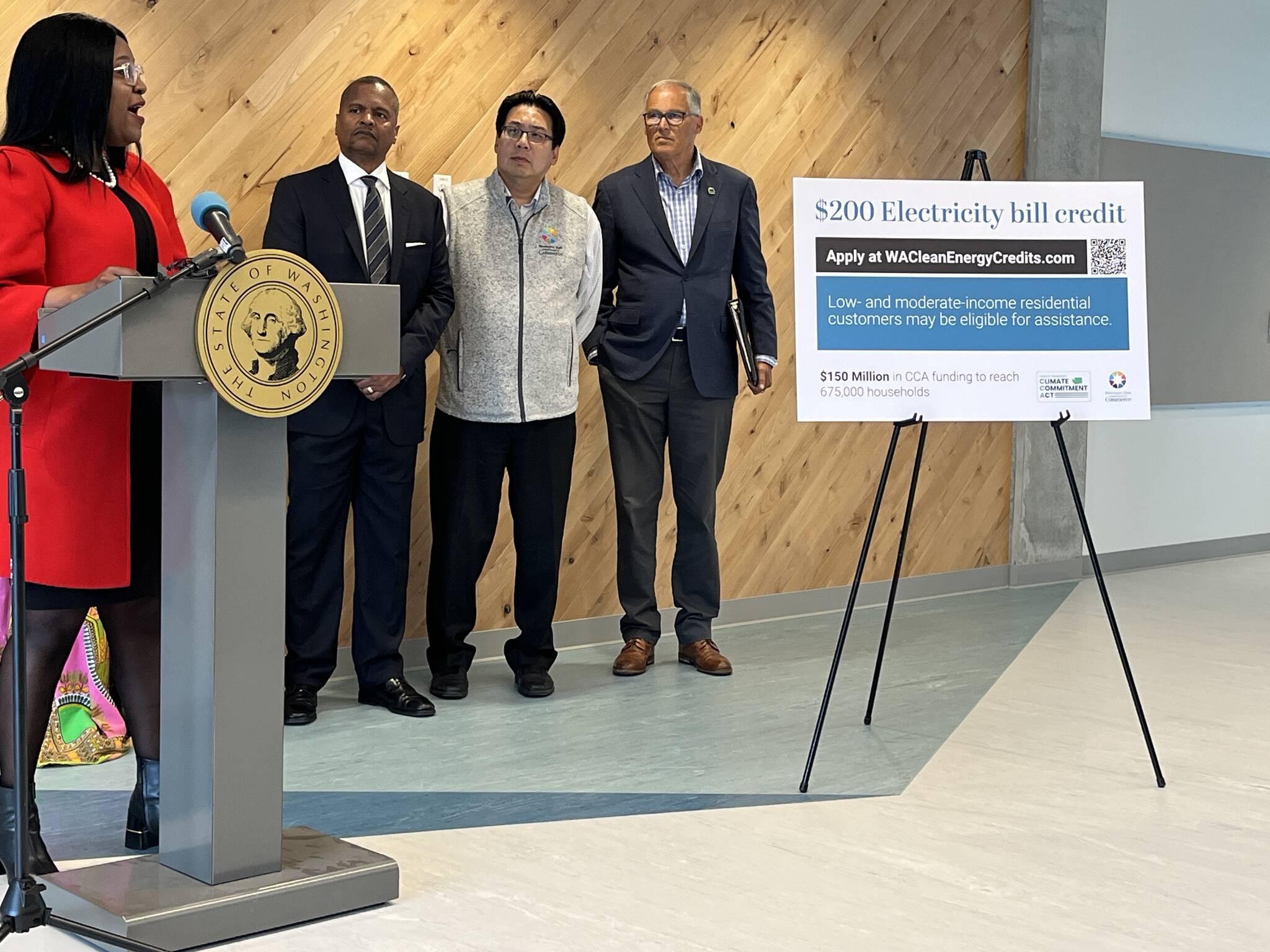 (Left to right) Executive Director of Housing Consortium of Seattle-King County Patience Malaba, Seattle City Light Chief Customer Officer Craig Smith, Commerce Director Mike Fong, and Gov. Jay Inslee at today’s press conference announcing the Washington Families Clean Energy Credit. Photo courtesy Washington State Department of Commerce