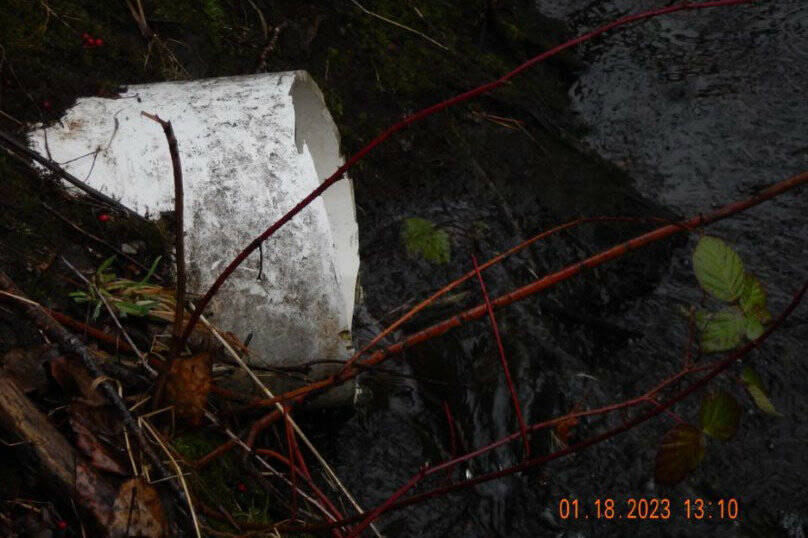 Photo courtesy the U.S. Environmental Protection Agency
A photo from the January 2023 site inspection of the Parker Hannifin facility in Enumclaw. Pictured is a pipe discharging water into a drainage ditch, although facility staff have noted in quarterly reports for the last several years that there was no discharge being made into the ditch.