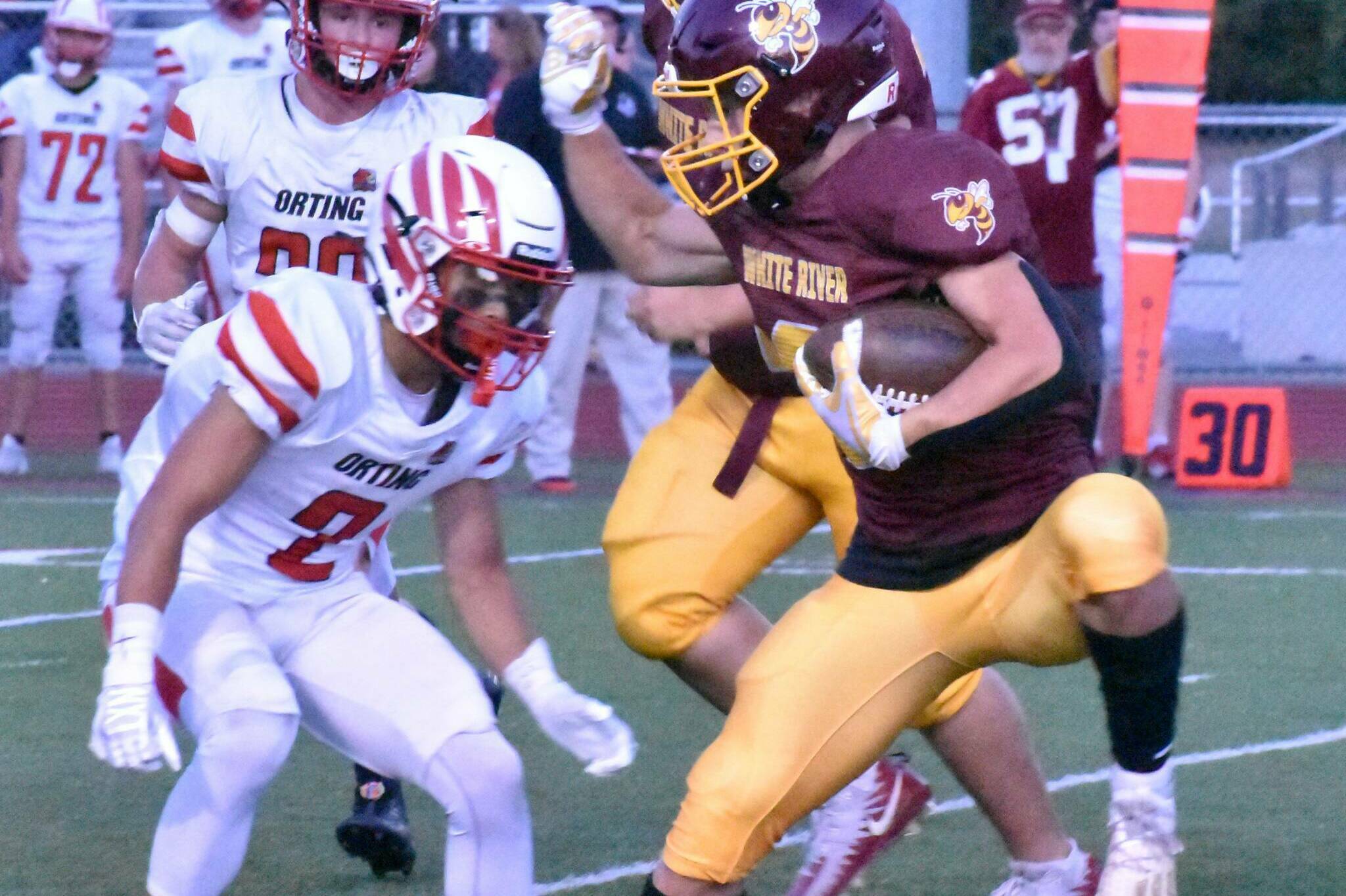 During White River’s Sept. 14, 2023 home game against Orting, Hornet running back Tate Bowen attempts to elude a Cardinal defender.