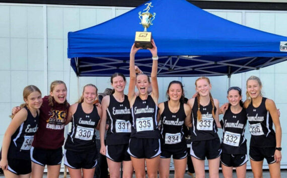 The Enumclaw High girls’ cross country team captured top honors during last year's league meet before heading to districts. Returning this year is Lily Haas (second to last on the right) and Brynne Stafford (last on the right). Contributed photo