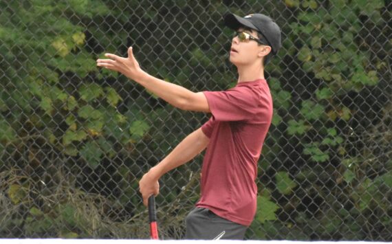 PHOTO BY KEVIN HANSON 
White River’s Ashton Chapin (pictured) was victorious Thursday afternoon in his No. 1 singles match against Enumclaw’s Amos Hall. It was Hall and his EHS teammates who had the last laugh, however, emerging with a 3-2 victory in the tennis edition of the Battle of the Bridge. For full match details, see the accompanying Sports Roundup.