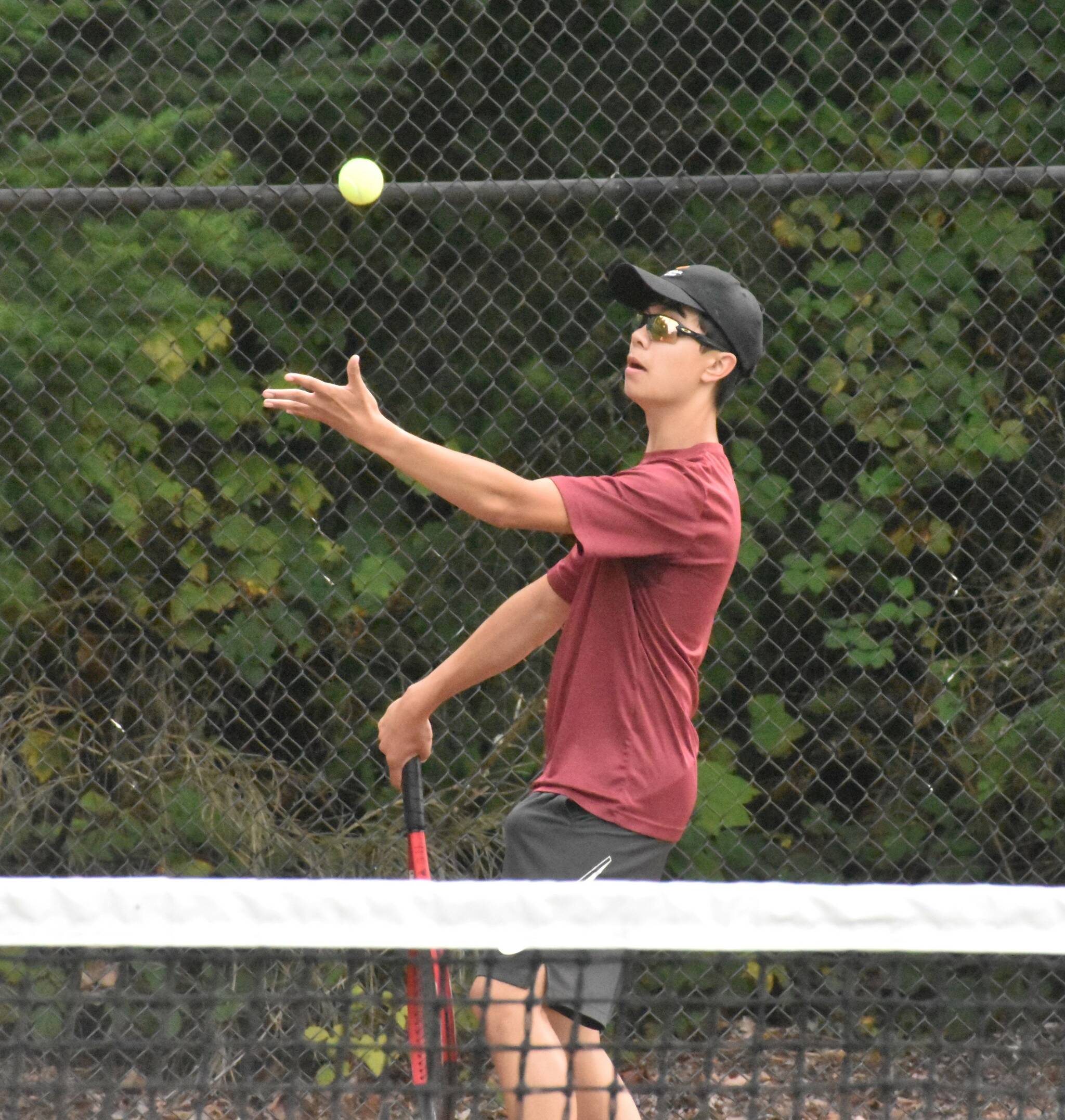 PHOTO BY KEVIN HANSON 
White River’s Ashton Chapin (pictured) was victorious Thursday afternoon in his No. 1 singles match against Enumclaw’s Amos Hall. It was Hall and his EHS teammates who had the last laugh, however, emerging with a 3-2 victory in the tennis edition of the Battle of the Bridge. For full match details, see the accompanying Sports Roundup.