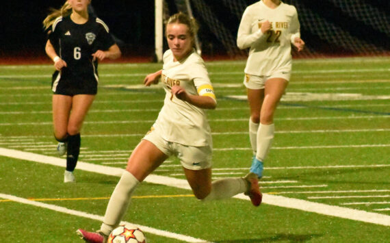 The White River High girls made the short trip to Bonney Lake High School last Thursday night for a nonleague game against the Class 4A Panthers. The teams walked off the field after battling to a scoreless tie. Pictured here are the Hornets’ Adalyn Sykes, chasing down a loose ball with teammate Jordyn Daigle in the background. PHOTO BY KEVIN HANSON