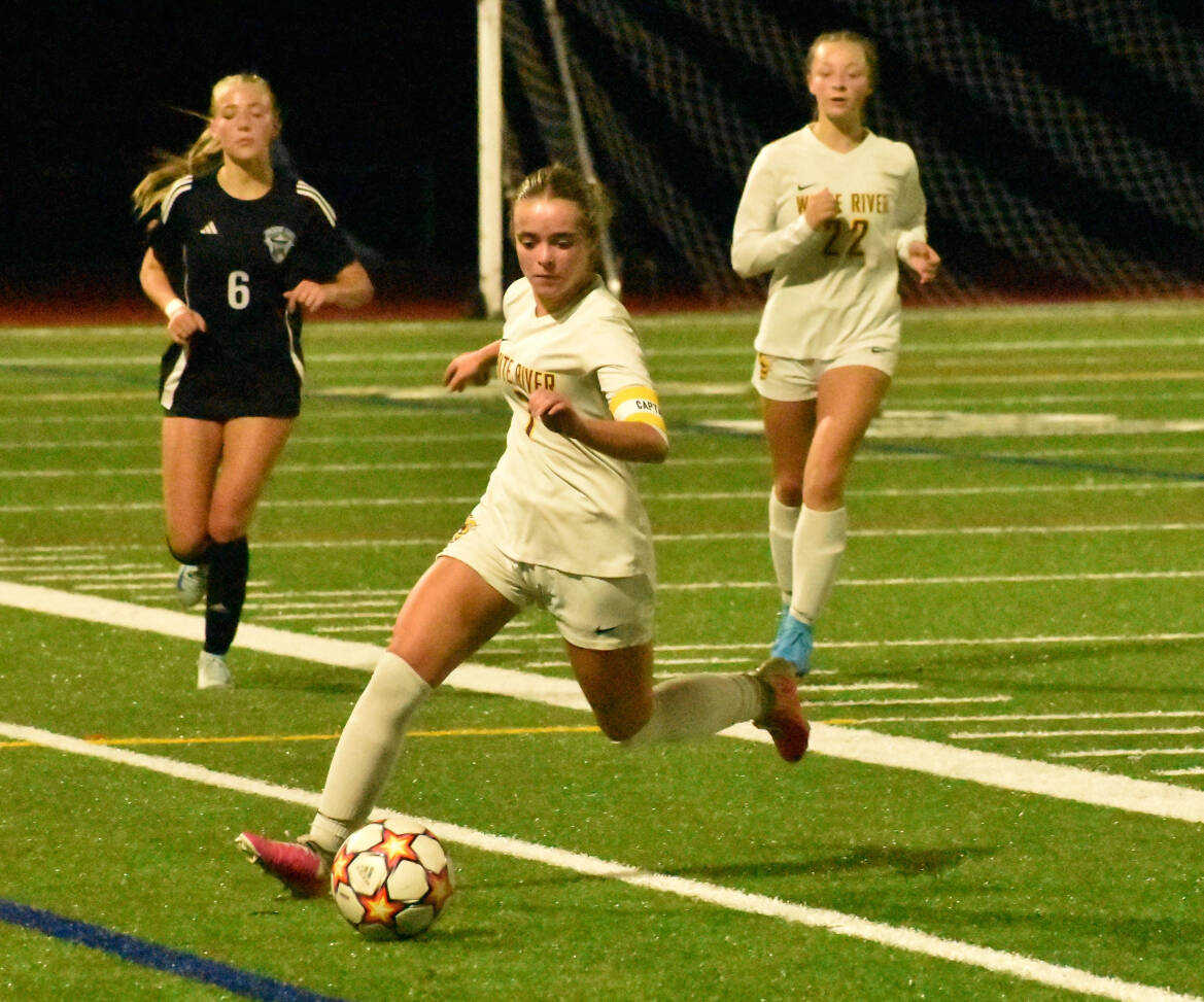 The White River High girls made the short trip to Bonney Lake High School last Thursday night for a nonleague game against the Class 4A Panthers. The teams walked off the field after battling to a scoreless tie. Pictured here are the Hornets’ Adalyn Sykes, chasing down a loose ball with teammate Jordyn Daigle in the background. PHOTO BY KEVIN HANSON