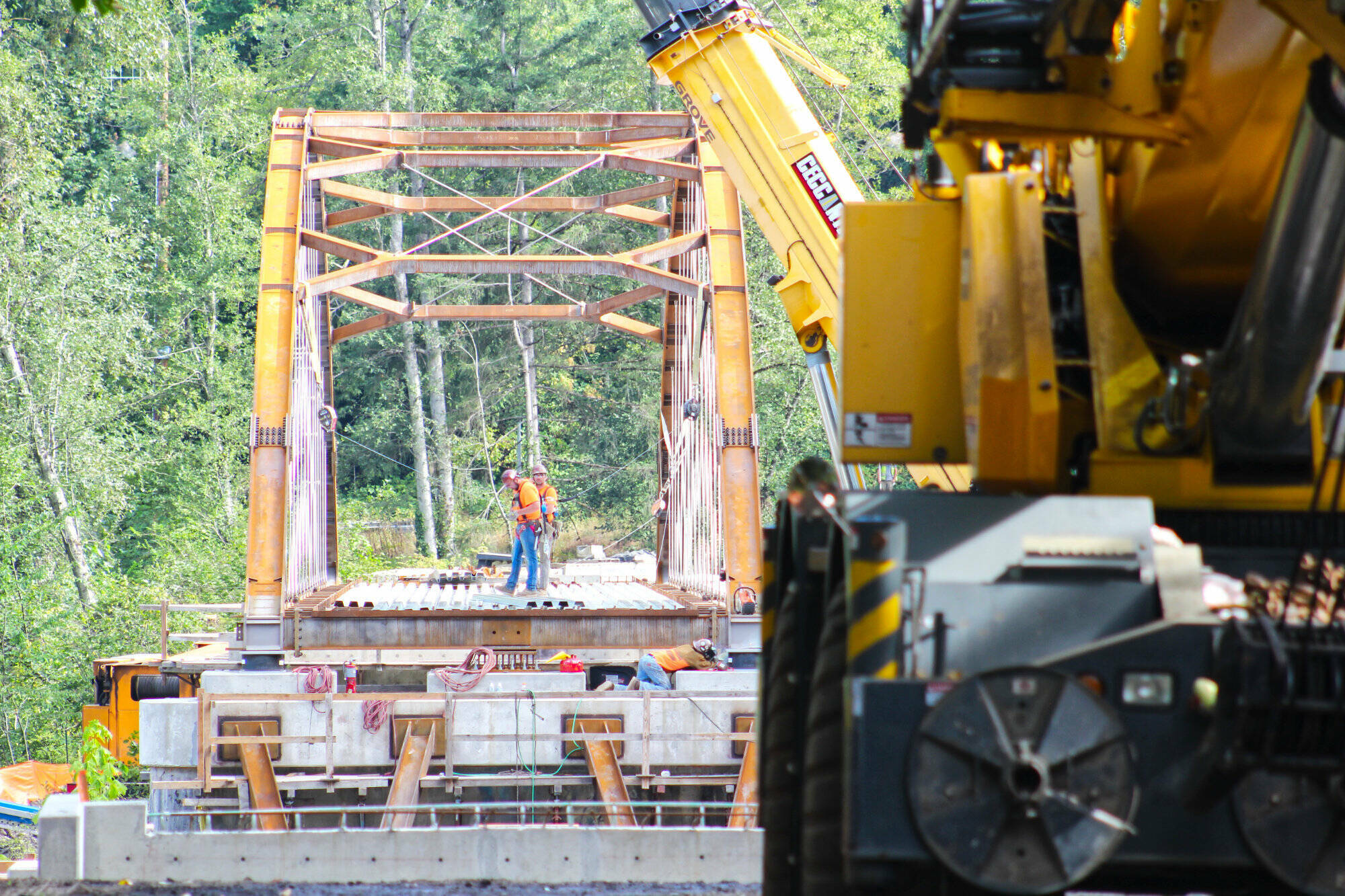 Construction crews working on the Foothills Bridge last August. Photo by Ray Miller-Still