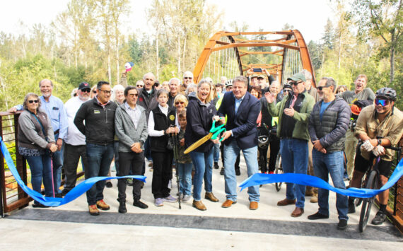 Photo by Ray Miller-Still
The crowd at the Foothills Trail bridge grand opening last Saturday found themselves practically shoulder to shoulder as they gathered on the new structure for the ribbon cutting. The bridge now connects pedestrians from Enumclaw and Buckley, and doubles as an emergency route for first responders of the traffic bridge fails.