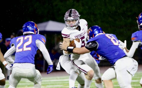 Photo courtesy Todd Overdorf / SonScape Images
ESH’s No. 5 Colton Paulson spins through defenders and fights forward for more yards after contact.