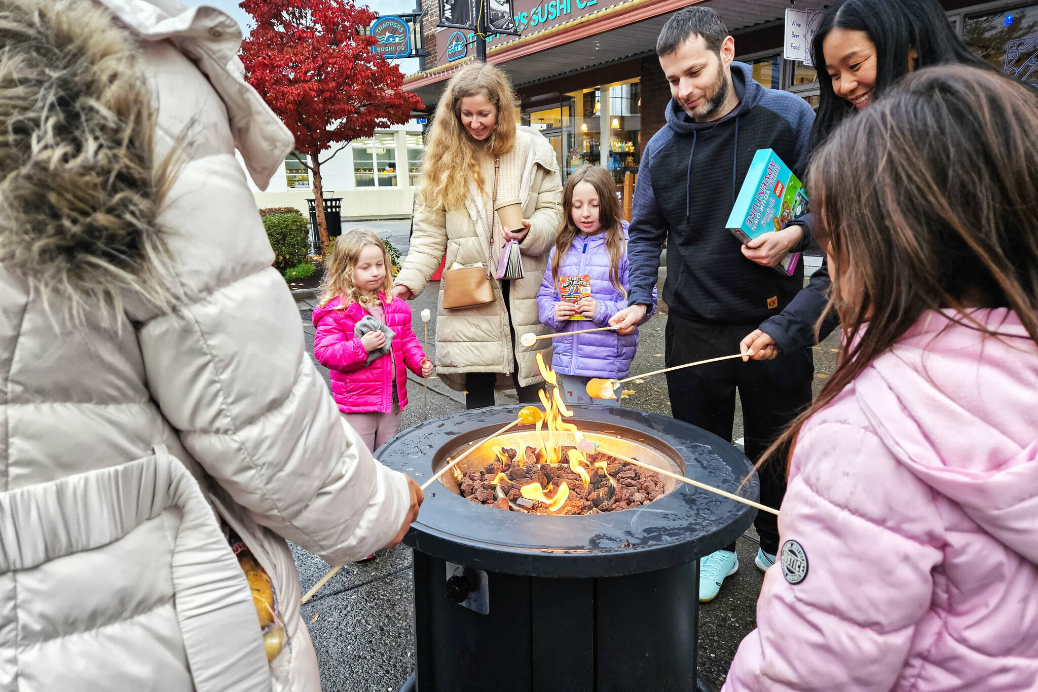 This year’s Winter Stoke Block Party is scheduled for Nov. 9 and features, among vendors and live music, marshmallow roasting. Here are some photos from last year. Photos by Ray Miller-Still