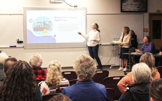 Sarah Tolbert and Cathy Dahlquist presented the Facility Oversight for Capital Utilization and Sustainability (FOCUS) Committee’s final report on Nov. 18 to the Enumclaw School District Board of Directors and a couple dozen attendees. Photo by Ray Miller-Still