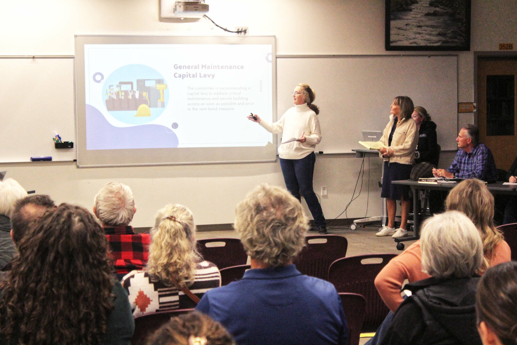 Sarah Tolbert and Cathy Dahlquist presented the Facility Oversight for Capital Utilization and Sustainability (FOCUS) Committee’s final report on Nov. 18 to the Enumclaw School District Board of Directors and a couple dozen attendees. Photo by Ray Miller-Still