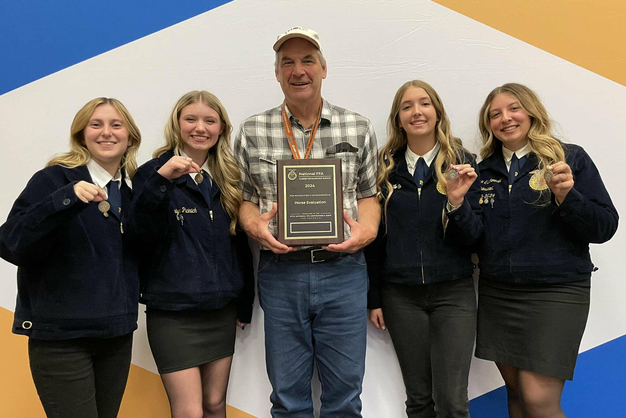 Submitted photo
Left to Right: EHS FFA members Sammy Tappero, Maiya Picinich, Riyan McGee, and Alina Cierkowskim, as well as agriculture teacher Mark Berryhill in the center.