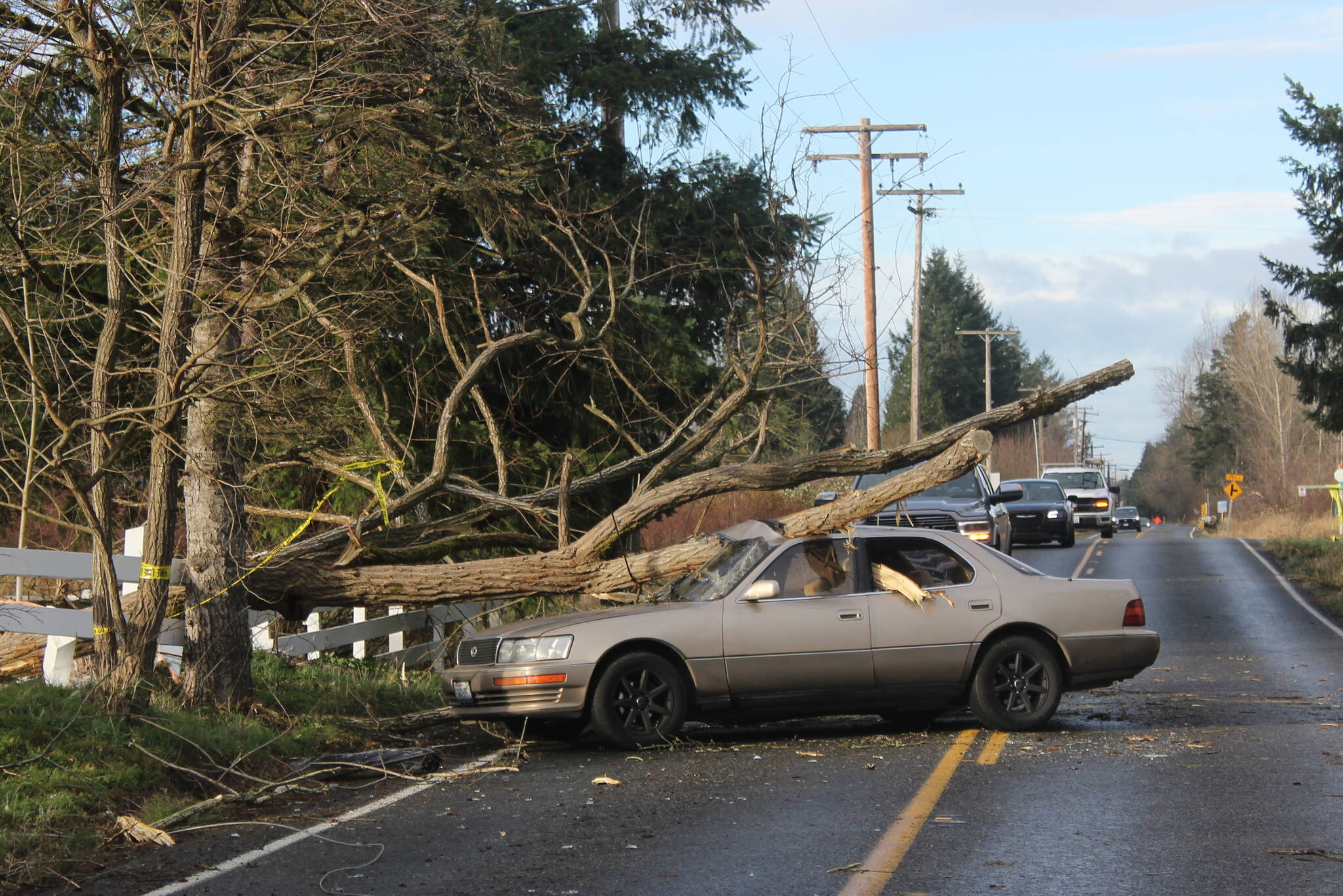 While the Enumclaw Fire Department reported no major injuries or deaths caused by the recent bomb cyclone, many cars, garages, homes, and other property were heavily damaged. Photo by Ray Miller-Still