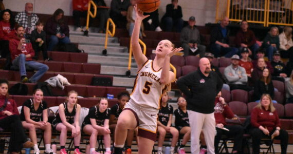 In this photo, Clare Largent (5) scores on a breakaway layin during the Dec. 12 game against the Kentlake Falcons. Photo by Kevin Hanson