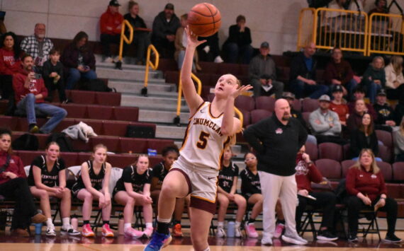 In this photo, Clare Largent (5) scores on a breakaway layin during the Dec. 12 game against the Kentlake Falcons. Photo by Kevin Hanson