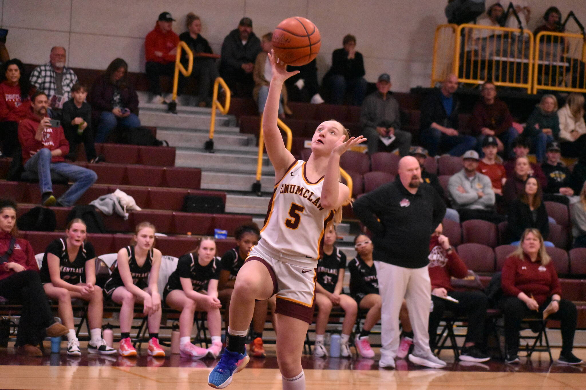 In this photo, Clare Largent (5) scores on a breakaway layin during the Dec. 12 game against the Kentlake Falcons. Photo by Kevin Hanson