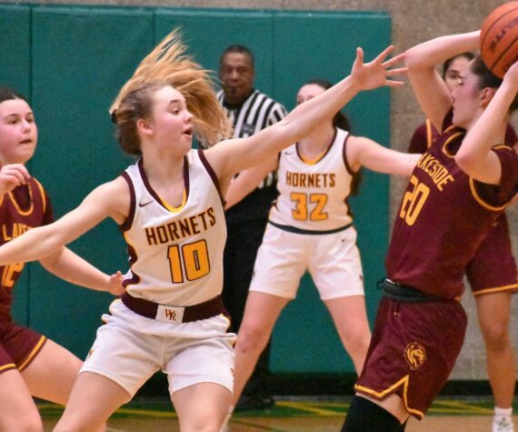 <p>PHOTO BY KEVIN HANSON </p>
                                <p>White River’s Kaitlyn Hewlett (#10) applies defensive pressure during the Hornets’ Saturday afternoon loss to the Lakeside Lions.</p>