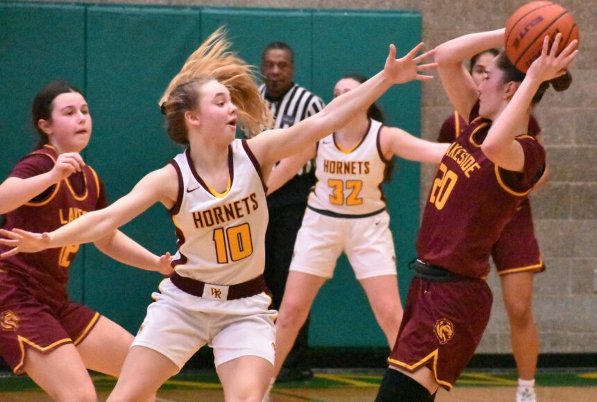 <p>PHOTO BY KEVIN HANSON </p>
                                <p>White River’s Kaitlyn Hewlett (#10) applies defensive pressure during the Hornets’ Saturday afternoon loss to the Lakeside Lions.</p>